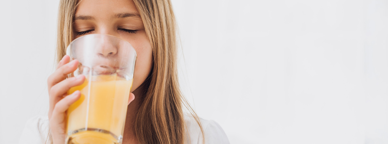 girl-drinking-orange-juice